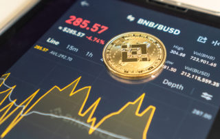 Bangkok, Thailand - 1 July 2021: Binance trading app with BNB altcoin digital coin crypto currency defi p2p decentralized fintech market technology application on ipad or smart mobile tablet | Aawut Law Firm