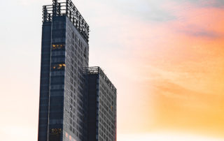 Asoke intersection and sky train station in Bangkok Thailand | Aawut Law Firm