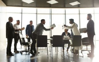 mixed race business partners arguing about bad contract | Pisut & Partners